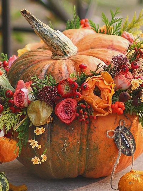 Pumpkin decorating ideas: floral centrepiece Urn Pumpkin Decor, Thanksgiving 2024, Pumpkin Arrangements, Fall Flower Arrangements, Halloween Flowers, Fall Floral Arrangements, Fall Entertaining, Pumpkin Flower, Fall Arrangements