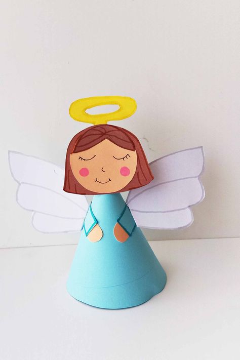 One of my favorite Christmas paper crafts for preschool is this cute angel craft!! Make your very own Christmas angel using my free printable template and instructions! One of the very easy Christmas crafts! Angel Projects For Kids, Angel Making Crafts, Mary And Angel Gabriel Craft, Easy Angel Crafts For Kids, Angel Appears To Mary Craft, Paper Christmas Angels, Guardian Angel Craft, Hand Print Angel, Religious Christmas Crafts For Kids