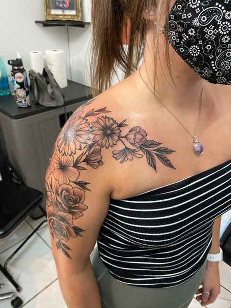 Shoulder And Arm Flower Tattoo, Shoulder Tattoos For Women Half Sleeves, Violet Flower Tattoo Shoulder, Shoulder Tattoo Flowers And Butterflies, Women's Shoulder Tattoos Ideas, Arm And Collar Bone Tattoo, Women’s Front Shoulder Tattoo, Shoulder Cap Half Sleeve Tattoo, Floral Shoulder And Arm Tattoo