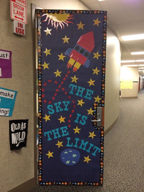 The sky is the limit :) my classroom door! Ideas To Decorate The Classroom, How To Decorate Classroom Door, Space Decor Classroom, Space Themed Bulletin Boards Ideas, Rocket Ship Door Decorations, Space Classroom Door Ideas, Out Of This World Classroom Door, Outer Space Door Decorations Classroom, The Sky Is The Limit Classroom Theme