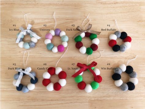 100% felted wool ball wreath ornaments! These make a cute addition to any tree or a great gift topper too!! Choose from 8 color combinations! All ornaments are labeled with a # beside each ornament in photo. The product will be exactly how it is displayed in the photo.  Only the ornaments shown in the photo with a bow will come with one. Each wreath is between approximately 3 - 3 1/2 inches across. **Note - #6 comes with a red and white bow not pictured. Feel free to message me to show you what it looks like. Felt Ball Ornaments, Felt Tree Ornaments, Felt Ball Crafts, Felt Ball Wreath, Diy Wool Felt, Wreath Ornaments, Ball Wreath, Needle Felted Christmas, Felt Tree