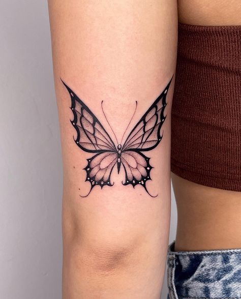 Butterfly Tattoo Styles, Cool Butterfly Tattoos Unique, Pointy Butterfly Tattoo, Butterfly Throat Tattoos Women, Back Of Arm Butterfly Tattoo, Tattoo On Thigh For Women, Sick Tattoos For Women, Grunge Butterfly Tattoo, Whimsical Butterfly Tattoo