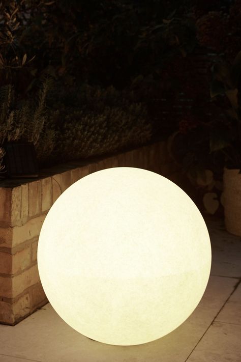 This concrete-effect solar sphere will be a contemporary addition to any garden. Run time 6-8 hours. Charge time 8 hours. Suitable for indoor and outdoor use.  100% Plastic. Concrete Garden Ornaments, Outdoor Solar Lamps, Sphere Light, Small Footstool, Garden Spheres, Orb Light, Buddha Garden, Concrete Statues, Small Lanterns