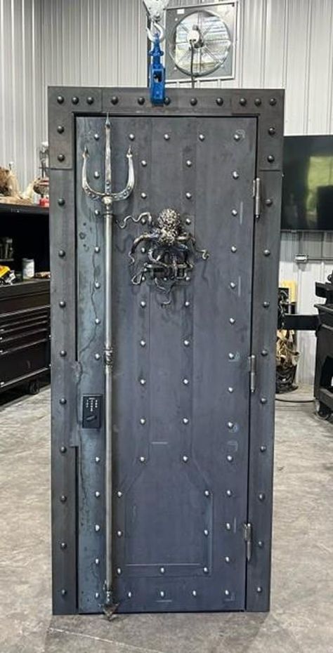 Custom Steel door. Can be used as a security door, safe or vault door or just an a conversation piece. Design options are endless...can be as mild or as wild as you like. Not just limited to doors. I can create any custom metal item for you at a very competitive price. Please contact me to discuss your needs and for a price quote. IN SWING DOOR DESIGN WILL COST $500 MORE. PLEASE CONTACT ME BEFORE YOU PURCHASE TO SPEAK ABOUT DETAILS OF YOUR ORDER Freight Shipping, delivery or pickup can be arrang Metal Security Door Design, Security Door Design, Carpentry Ideas, Main Gates, Gates Design, House Main Gates Design, Vault Doors, Cabin Doors, Main Gate Design