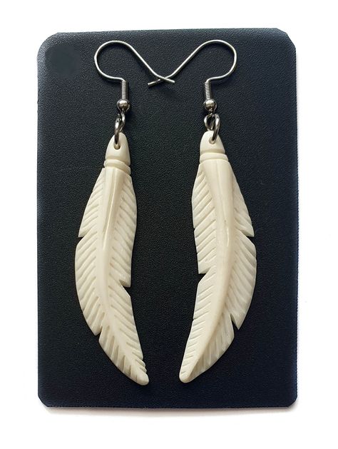 PRICES MAY VARY. These Bone Earrings feature a beautiful bone feather hand carved out of ox bone wonderful detail. Unique! Earrings Material: Ox Bone Earring Length (with Hook): 2.4 inch (60mm) Earring Size: 1.6 x 0.4 inch (40mm x 10mm) Hook Type: French Hook These Bone Earrings feature a beautiful bone feather hand carved out of ox bone wonderful detail. Unique! Witchy Business, Feather Fashion, Bone Earrings, Bone Jewelry, Earrings Handmade Dangle, Carved Bone, Bone Carving, Feather Earrings, Hook Earrings