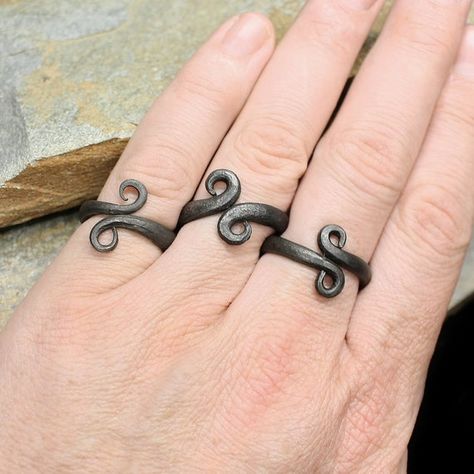 Hand-Forged Iron Viking Ring.Our Viking replica rings are made from hand-forged iron and are direct replicas of genuine Viking finds! Available in 3 sizes, they are ideal for Viking men or Viking women.Hand-forged iron Viking ring in 3 sizes.Small size - weight 5g (0.18oz).Large size - weight 6g (0.2oz)XL size - weight 7g (0.25oz)Non-adjustable, so please check your size before ordering.Ring size guide:Small = 16 - 18mm internal diameter / US size 5.5 - 7.5 / UK size L - PLarge = 20 - 23mm inter Viking Men, Iron Jewelry, Viking Women, Bf Gifts, Viking Ring, Iron Ring, Hand Forged Iron, Presents For Men, Jewellery Ideas