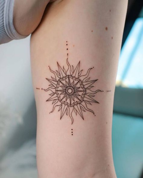 Fine line sun and compass rose tattoo on the bicep Ornamental Sun Tattoo, Mandala Sun Tattoo, Sun Tattoo Meaning, Simple Sun Tattoo, Sun Tattoo Design, Compas Tattoo, Sun Tattoo Small, Compass Rose Tattoo, Leo Tattoo