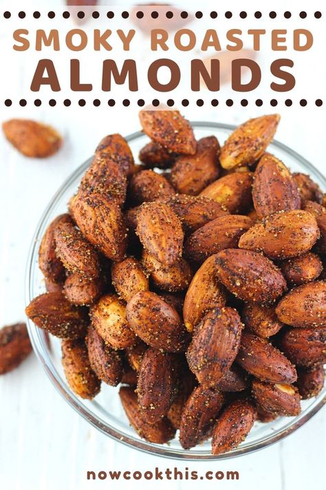 These Smoky Roasted Almonds are a quick, easy, healthy (and addictive) snack that you make right in your own oven...no smoker needed! They're subtly smoky, garlicky, salty, and absolutely delicious. Perfect as a pre-dinner nibble, great paired with drinks, and fabulous for snacking any time. Get the recipe and try them! #smokyroastedalmonds #roastedalmonds #almonds #snacks #healthysnacks Seasoned Roasted Almonds, How To Season Almonds, Oven Roasted Almonds Recipe, Roasted Almonds Recipe Healthy, Cocoa Almonds Recipe, Roasted Almond Recipes, Roast Almonds In Oven, Seasoned Almonds Recipes, Smokehouse Almonds Recipe