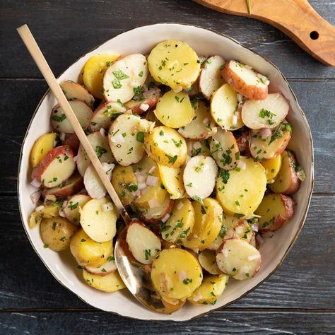 French potato salad is vinegar-based instead of creamy, made with Dijon mustard, olive oil, scallions or shallots, and fresh herbs. —Taste of Home Test Kitchen The post French Potato Salad appeared first on Taste of Home. Authentic German Potato Salad, French Potato Salad, Chives Recipe, French Potatoes, German Potato Salad, Summer Side Dishes, Fresh Chives, Potatoe Salad Recipe, Perfect Side Dish