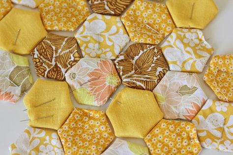 I’ve been meaning to make a hexagon quilt forever. It’s one of my lifelong dreams. All my sewing idols have done it. They are so pretty and would be such a neat keepsake. I really want a full size one to drape over my bed.But every time I think about making one I think about […] Hexagon Quilt Tutorial, Hexagon Patchwork, Hexie Quilt, English Paper Piecing Quilts, Quilt Vintage, Sketchbook Cover, Restaurant Ideas, Bee Party, Quilt Tutorial