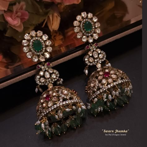 Absolutely Real looking polki jewellery for Wedding related functions Making: This Royal Antique Gold look Big size Jhumki is Handmade It is Uniquely handcrafted by our Skilled Master Goldsmith Craftsman with detailed finishing Stones: It has Excellent Lustre of Moissanite Polkis which are best substitute for Real Polkis. These polkis have Silver Daak at Back side and are set in open setting. Colour stone: Emerald and Ruby Looking Semi precious stones with Real Fresh water Rice Pearl's. Uncut Jewellery, Jewellery For Wedding, Jhumka Designs, Bridal Jewellery Earrings, Wedding Jewelery, Indian Jewelry Earrings, Pretty Jewelry Necklaces, Antique Bridal Jewelry, Colour Stone