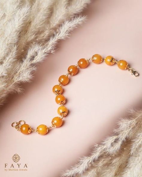 Faya Jewels on Instagram: "Amber is one such gemstone that has the power to illuminate one's life with its beautiful healing powers. 💛 Amber is a unique organic gemstone in its colour, rarity, natural beauty & one of a kind nature. Aahana bracelet handcrafted out of pure golden 8 mm Amber beads strung in 18k gold is a perfect arm accessory to make you look polished and elegant. Check out our variety of Amber bracelets on our website www.fayajewels.com #amberbracelet #amber #balticamber #balt Arm Accessories, Golden Amber, Amber Bracelet, Amber Beads, Healing Powers, Bead Stringing, Rarity, Gemstone Healing, Amber