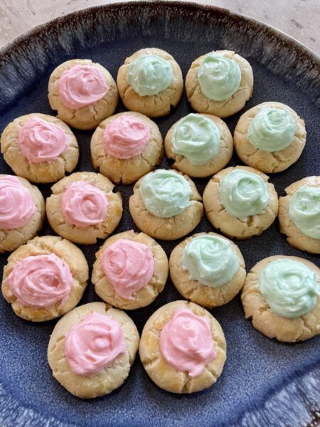 Thumbprints with Buttercream Frosting Sugar Thumbprint Cookies, Thumbprint Cookies Buttercream, Homemade Thumbprint Cookies, Thumbprint Cookies With Frosting, Almond Flavored Cookies, Cake Mix Thumbprint Cookies, Crumbl Recipes, Thumbprint Cookies With Icing, Best Thumbprint Cookies