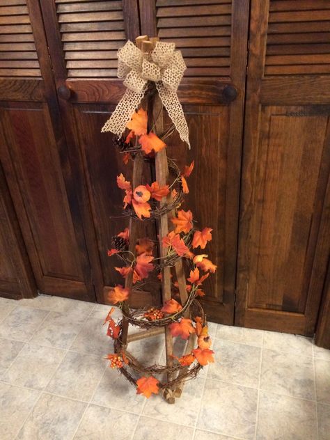 Tobacco stick tree decorated for fall. Tree Decorated For Fall, Stick Tree, Gifts Drawing, Rustic Wood Crafts, Stick Christmas Tree, Fall Ornaments, Stick Crafts, Rustic Crafts, Fall Halloween Crafts