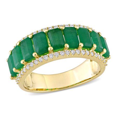 This breathtaking Miabella Emerald and Diamond Semi-Eternity Anniversary Ring is one to be cherished forever. Crafted in lustrous 14-karat yellow gold, this charming ring features nine octagon-cut, prong-set emerald gemstones (5x3mm) and 48 round-cut, buttercup-set diamonds (G-H, I1). Enhanced with a polished finish, this glistening ring is a true work of art. Nothing says 'I love you' like this gorgeous ring. Size: 8.5.  Color: Green.  Gender: female.  Age Group: adult. Emerald Anniversary, Emerald Band Ring, Unique Ring Designs, Rings Vintage, Unique Ring, Emerald Stone, Women Diamond, Eternity Band, Emerald Diamond