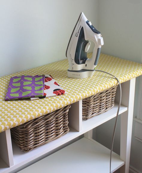 This clever IKEA hack turns the top of a long table into an ironing space, and offers spots for baskets underneath. Ironing Station, Ikea Side Table, Sewing Room Organization, Ideas Para Organizar, Diy Casa, Quilting Room, My Sewing Room, Ironing Board, Laundry Room Organization