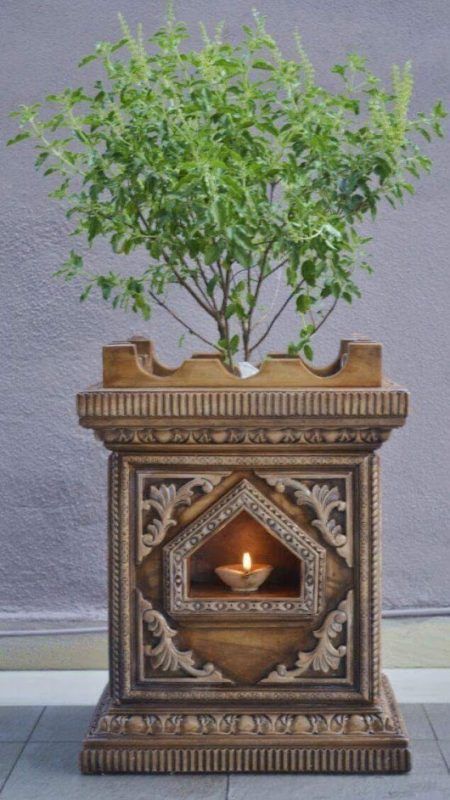 7 #Plants Which You Can Bring Home This #Diwali For Luck And Prosperity https://threads.werindia.com/home-living/7-plants-which-you-can-bring-home-this-diwali-for-luck-and-prosperity/ #Threads #WeRIndia Tulsi Design For Home, Tulsi Plant Decor, Tulsi Pot Design Traditional, Tulasi Pot Design, Tulsi Pot Design Modern, Tulasi Kota Designs, Tulsi Pot Design, Thulasi Plant Decoration, Indian Plants