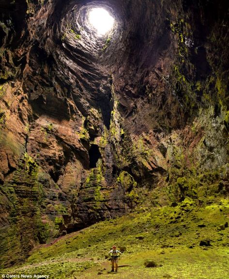 Deep down: Photographer Amy Hinkle shot the spectacular images in January while on a week-long expedition to the caves of the Aquismon region in Mexico    Read more: http://www.dailymail.co.uk/news/article-2288920/Real-life-hobbit-holes-Mexico-330-metre-drop-claimed-dozens-climbers-lives. Mexico Travel, Places Around The World, Amazing Nature, Belle Photo, Vacation Spots, Wonders Of The World, Places To See, Beautiful Nature, Places To Travel