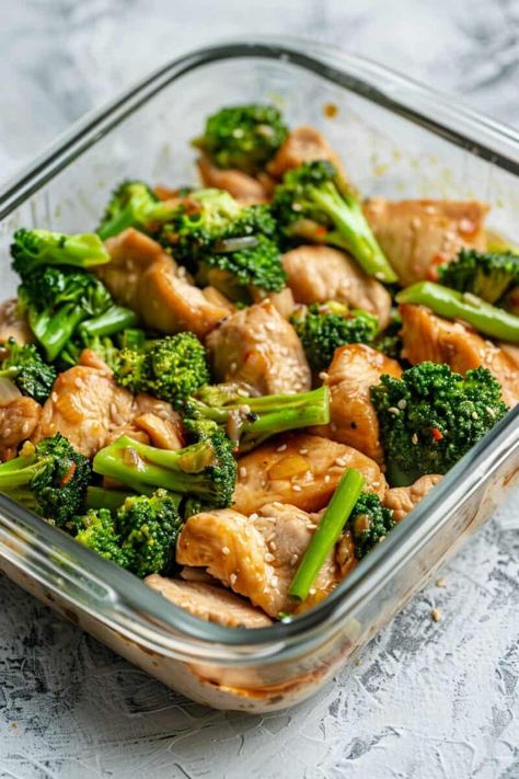 Photo showing a colorful Chicken and Broccoli Stir-Fry in a glass container. The chicken is golden-brown, and the broccoli is a bright green. Everything is coated with a glistening soy sauce and honey glaze. Pork Meatloaf, Chicken Broccoli Stir Fry, Lemon Butter Chicken, Grilled Chicken Thighs, Broccoli Stir Fry, Chicken And Broccoli, Dinner Meal, Easy Healthy Meal Prep, Quick Chicken