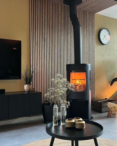 We're feeling inspired by @fem_ke73's Scandi styled living room - a flawless open-plan design that seamlessly ties minimalism with cosyology. We love the combination of the glowing Contura stove combined with the natural texture of the feature wall. 🔥 📸 @fem_ke73 #conturastoves #cosyology #flames #woodburningstove #woodburner #woodburnerstove #fireburning #cosyfire #interioredesign #scandinavianlivingroom Beach House Fireplace, Modern Log Burners, Timber Feature Wall, Styled Living Room, Wood Stove Wall, Log Burner Living Room, Modern Stoves, Scandi Living Room, Wood Burning Stoves