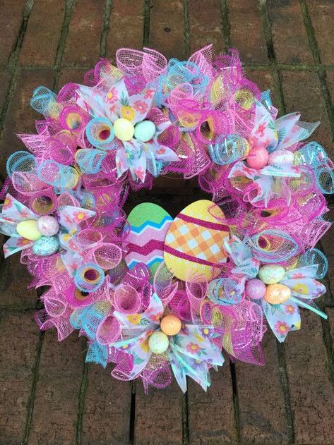 If you want to get your home ready for Spring, then check out these Dollar Store Easter Decorations to keep your budget on track. Easter Wreath Diy Dollar Stores, Easter Crafts Dollar Store, Easter Deco Mesh Wreath, Easter Mesh Wreaths, Deco Mesh Wreaths Diy, Easter Wreath Diy, Easter Spring Wreath, Easter Egg Wreath, Mesh Wreath Diy