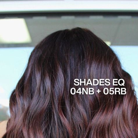 Redken on Instagram: "Looking for a classic with some kick? We suggest Cherry Cola 🍒🥤  @beardedbeautyhair makes use of their client’s grown out balayage to add rich, red-violet tones to h their base.   A concern many stylists have taking their previously lightened clients darker: the hair lacking depth and lustre. This formula creates ribbons of dimension with that iconic #ShadesEQ shine ✨ Swipe to see the before.  The #RedkenRecipe: 🩷 Zone 1: Shades EQ 04NB (2/3) + 05RB (1/3) 🩷 Zones 2 + 3: Shades EQ 05RV + 05RB (equal parts)  #CherryCola #CherryColaHair" Grown Out Balayage, Shades Formulas, Redken Formulas, Cherry Cola Hair Color, Cola Hair, Redken Color Gels, Cherry Cola Hair, Women's Haircuts, Violet Brown