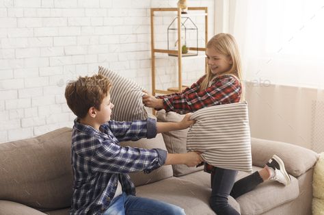 Boy And Girl Having Fun Fighting With Pillows At Home by Prostock-studio. Siblings Friendship. Cheerful Boy And Girl Having Fun Fighting With Pillows Playing Together On Sofa At Home. #AD #Fighting, #Pillows, #Home, #Boy Teenage Siblings, Boy And Girl, Having Fun, Bean Bag Chair, Boy Or Girl, Kids Rugs, At Home, Sofa, Pillows