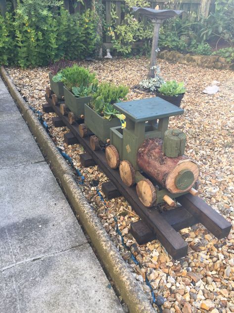 Wooden Train Planter, Garden Trains Backyards, Old Plow Yard Decor, Garden Wood Projects, Landscape Timber Crafts, Wooden Garden Ornaments, Train Planter, Train Garden, Landscape Timbers