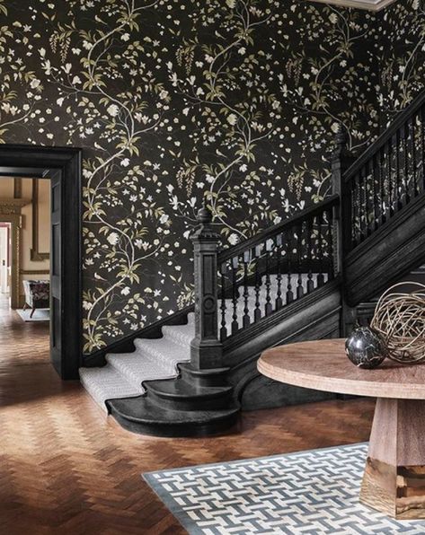 There's a lot to love about traditional decor. The timeless aesthetic is known for classic patterns, a muted color palette, uncompromising attention to detail, and metallic finishes. Check out these seven traditional staircase ideas for inspiration. #hunkerhome #staircase #traditional #staircaseideas #stairs Black Stair Railing, Black Stairs, Wood Handrail, Traditional Staircase, Timeless Interiors, The Staircase, Stair Railing, Grey Wallpaper, Hotel Design