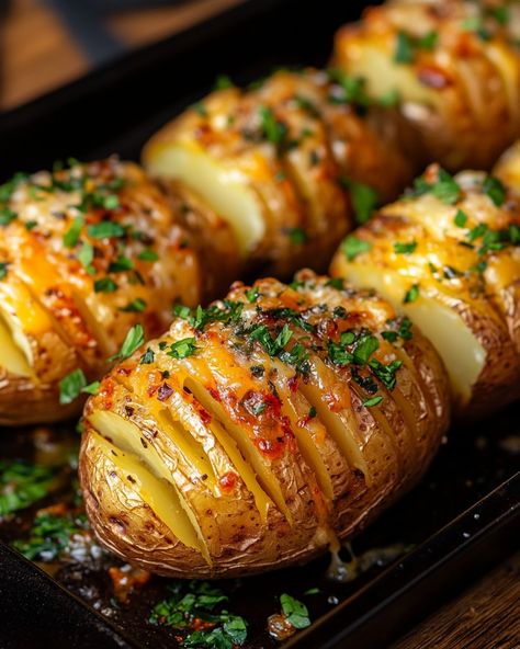 "OMG, these Cheesy Garlic Hasselback Potatoes are a game changer! They’re crispy on the outside, soft and cheesy on the inside – a total crowd-pleaser!   Ingredients: - 4 medium potatoes - 1 cup shredded cheese (your choice!) - 4 cloves of garlic, minced  For the rest of the ingredients and instructions, Link in first comment [👇] [👇]  Don't miss out on this cheesy goodness! Perfect for a side dish or snack.   #HasselbackPotatoes #CheesyGoodness #GarlicLovers #EasyRecipes #SideDish" Potato Food Photography, Potato Hasselback, Cheesy Hasselback Potatoes, Food Potatoes, Hasselback Potatoes, Easy Food Art, Crispy Potatoes, Sliced Potatoes, Potato Dishes