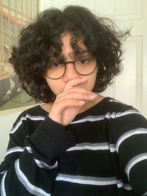 short curly hair bangs grown out mullet Bob Short Curly Hair, Fluffy Curly Hair Short, Short Fluffy Hairstyles Curly Hair, Gender Fluid Curly Hair, Gender Fluid Hair Curly, Gender Neutral Haircuts Curly Hair, Fluffy Curly Hairstyles, Curly Haircut Round Face, Curly Tomboy Hair