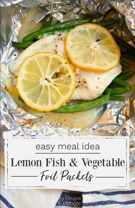 Grilled or baked fish foil packets with vegetables and lemon are a terrific, healthy weeknight dinner the whole family will love! #fish #seafood #seafoodrecipes #foilmeal #foilpackets #grilling #grilledfood #bakedfish #anoregoncottage Fish Foil Packets, Fish In Foil Packets, Grilled Foil Packets, Lemon Fish, Haddock Recipes, Foil Pack Dinners, Foil Packet Dinners, Foil Pack Meals, Foil Packet Meals