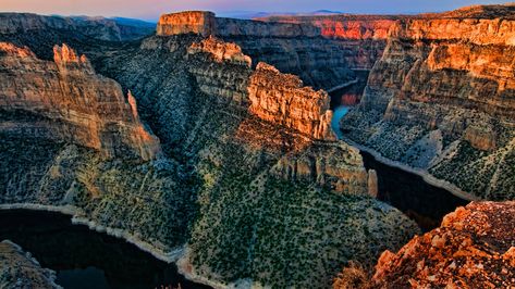 This recreation area straddles the northern Wyoming and southern Montana borders, preserving approximately 68,000 acres between the Pryor and Bighorn mountain ranges. The park was established in 1966 following the construction of the Yellowtail Dam by the Bureau of Reclamation to preserve the area's diverse landscape, including the spectacular Bighorn Canyon and Bighorn Lake. Summer Scrapbook, Scenic Photography, National Parks Trip, Photography For Beginners, Big Sky, Pacific Northwest, Wyoming, Monument Valley, Places To See