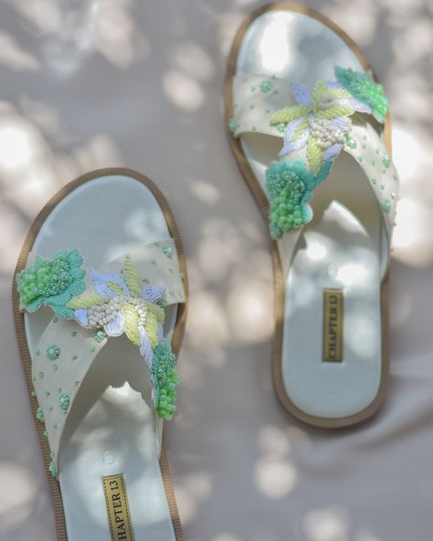 •Mint Bloom Slides in the refreshing Mint Bloom colorway! These chic slides feature intricate hand embroidery done with matte thread in shades of white and mint, along with various sizes and shades of beads. The cross strap design adds a touch of elegance, while the exaggerated sole with welt provides a stylish edge. Elevate your summer look with our Mint Bloom Slides! Launching online on 8th June 24 at www.chapter13online.com #heartmade #shoes #newarrivals #chapter13 Best Slides, Cool Slides, Slide Shoes, Footwear Design, Slides For Women, Shoes For Girls, Women Slides, Beautiful Dress Designs, Chocolate Bouquet