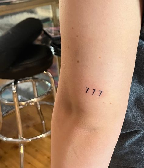 444 Tattoo Above Elbow, 777 Fine Line Tattoo, Fine Line 777 Tattoo, Minimalist Angel Number Tattoo, Angel Number Tattoo Back Of Arm, 777 Tattoo, 22 Tattoo, Number Tattoos, Above Elbow