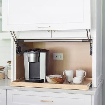 Kitchen Cabinet With Garage Style Door Design Ideas Coffee Hidden Cabinet, Mini Fridge Hidden In Cabinet, Pull Up Kitchen Cabinet Doors, Hidden Coffee Station, Appliances Cabinet, Kitchen Terracotta, Light Grey Kitchen Cabinets, Herringbone Tile Backsplash, Coffee Station Kitchen