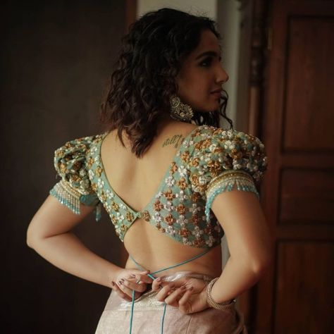 Latest and trendy designer blouses 2021 by Sruti Kannath! Choli Blouse Design, Saree Blouse Styles, Blouse Designs Catalogue, Latest Model Blouse Designs, Backless Blouse Designs, New Saree Blouse Designs, Fashionable Saree Blouse Designs, Lehenga Blouse Designs, Blouse Back Neck Designs