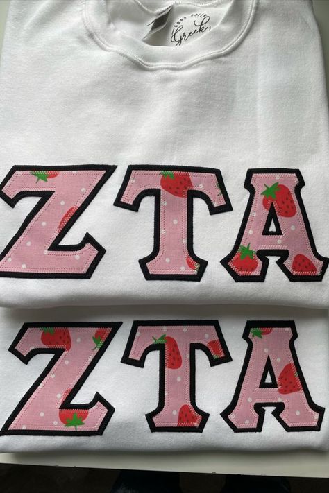 Good Golly Greek Zeta Tau Alpha Strawberry Sorority Stitched Letters. Looking for the perfect gift for the sorority sister in your life? Look no further! These letters are the perfect way to rep a sorority on and off campus. To view all the color combination options, click the link to our website. #SororityApparel#StitchedLetters#ZetaTauAlpha#BigLittleBasket#InitiationBasket Strawberry Sorority, Sorority Stitched Letters, Zeta Tau Alpha Letters, Sorority Baskets, Sorority Shirts Letters, Big/little Baskets, Senior Night Posters, Greek Letter Shirts, Stitched Letters