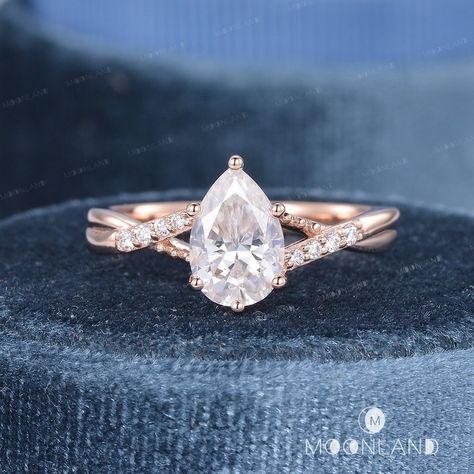 1.5CT Moissanite Engagement Ring Rose Gold Wedding Ring Pear Shaped Moissanite Ring Art Deco Ring Women Split Shank Ring Twist Ring Infinity Unique Ring Check the bridal set: https://www.etsy.com/listing/1312956716 Check the bridal set with pearl band: https://www.etsy.com/listing/1230486837 🌙 Product Details -Center Stone: Colorless Moissanite, 6*9mm, Pear Shaped -Weight about: 1.5CT -Colorless/D Color, VVS Clarity -Stone: Moissanite, DEF/VVS-VS or Natural Diamond, H Color, SI Clarity(choose o Split Band Pear Engagement Ring, Pear Rose Gold Engagement Ring, Rose Gold Pear Engagement Ring, Tear Drop Wedding Ring, Wedding Ring Pear, Pear Shaped Wedding Rings, Ring Pear Shaped, Pear Wedding Ring, Split Shank Engagement Ring