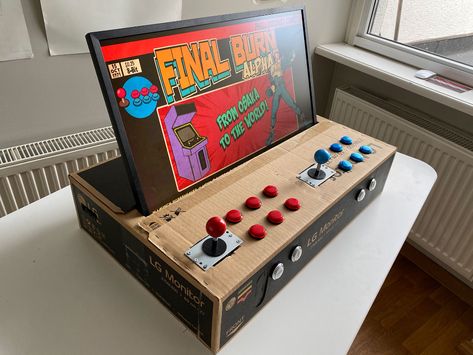 Build an arcade machine at home: Step-by-step guide - Lokalise Blog Diy Arcade Machine, Haunted Arcade, Pi Arcade, Arcade Diy, Diy Arcade Cabinet, Home Arcade, Diy Arcade, Arcade Buttons, Arcade Table