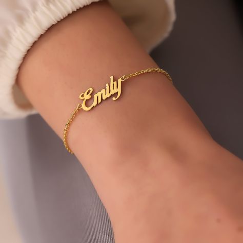 "The Elegant Name Bracelet and Family Birthstone Bracelet, which we offer in 925 Carat Silver or 14 Carat Gold, is the best gift for the mother. The 14K solid version of the birthstone bracelets also comes with a 14K solid gold chain. There is a perfect harmony of silver or gold. Quality in this handmade gold and silver birthstone bracelet.  PRODUCT HIGHLIGHTS  Custom Bracelet For Women Made of High Quality 925 Sterling Silver or 14K Solid Gold You can personalized this silver bracelet with your Silver Name Bracelet, Nameplate Bracelet, Handmade Gold Necklace, Name Bracelets, Bracelet Initial, Gift For Mothers Day, Custom Bracelet, Birthstone Bracelet, Solid Gold Chains