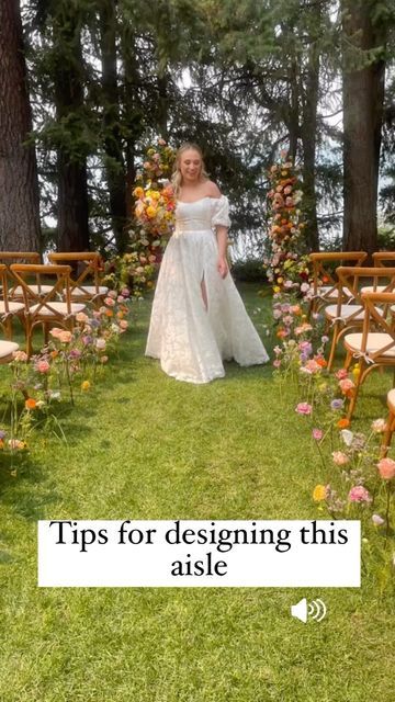 Eden Frei | Coeur D’alene Wedding Florist on Instagram: "Tips for designing this aisle you all adore: 1. The water picks pound into the grass better if it has soft soil. Use a rubber hammer. The picks also came out of the grass with less damage this way. 2. If water picks don’t insert easily, take a battery powered drill to help make the holes 3. This design used approximately 10 full stems per chair which we extended into the path as well. 3. Cut some flowers short and insert at varying heig Flowers Stuck In Ground Wedding, Wildflower Aisle Arrangements, Aisle Floral Decor, Wild Flower Wedding Theme Ceremony Decor, Wild Flower Aisle Wedding, Flowers In Ground Wedding Aisle, Flowers Lining Aisle, Diy Aisle Flowers, Wild Flower Aisle