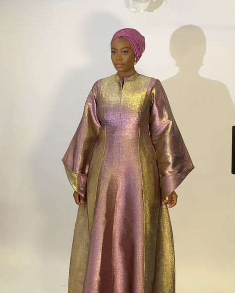 Rawsilk | Eid Dresses | Modest Fashion | Scarves | on Instagram: "Look 4   Metallic two toned Kaftan in magenta and gold  Also available in maroon and gold   Fabric: luxury Damask   Price : N95,000 Raw silk scarf : N6,500  Kindly click link in bio to place order  Worldwide shipping available" Metallic Organza Dress, Metallic Fabric Dress, Organza Bubu, Silk Abaya, Damask Style, Kaftan Styles, Damask Dress, Eid Dress, Long African Dresses