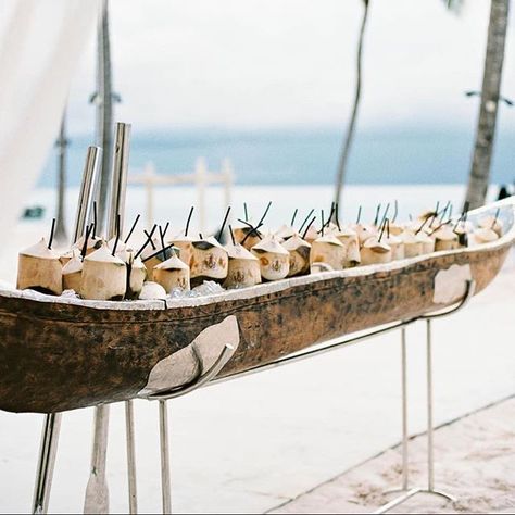 How amazing is this boat bar filled with monogram-carved coconut drinks captured by Dominican Republic #weddingphotographer @asiapimentelphotography?! . planning design and styling @claireduranweddingsandevents @whenpigsflyevents and @alchemyeventsvw venue @scapepark boat bar @divano_rd #ruffledvendor #weddingphotography #photography #weddingplanning #weddingdesigner #eventdesign #weddingideas #coconuts #drinksdisplay #beachwedding #dominicanrepublicwedding #ohwowyes #destinationweddingphotograp Outdoor Beach Decor, Boat Bar, Dominican Republic Wedding, Pina Coladas, Destination Wedding Decor, Boat Wedding, Coconut Drinks, Beach Bbq, Key West Wedding