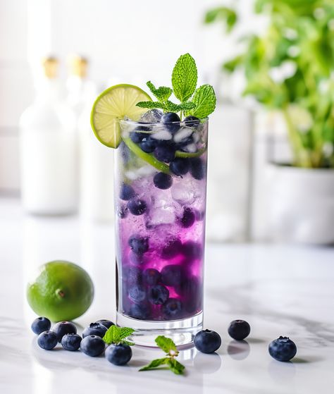 Blueberry mojito Blueberry Mojito, Blueberry Mint, Cocktail Umbrellas, Popular Cocktails, Nugget Ice Maker, Nut Free Recipes, Blueberry Juice, Colorful Cocktails, Drink Alcohol