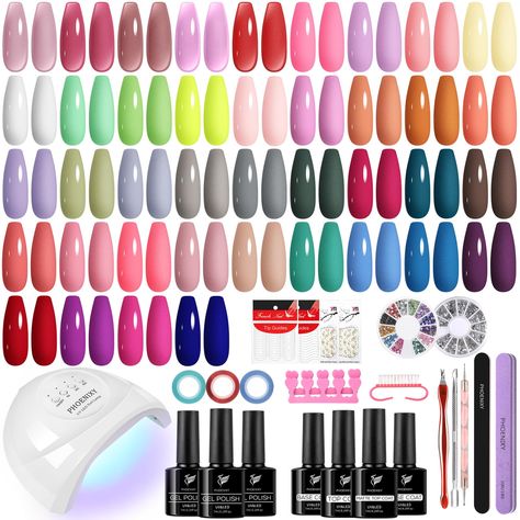 PRICES MAY VARY. [PHOENIXY Gel Nail Polish Kit with Nail Lamp]: 40 colors 7ml gel nail polish, 2 pcs 7ml base coat, 7ml top coat, 7ml matte top coat, nail decorations and other manicure tools. A cost-effective kit for manicure beginners and lovers. With some practice, you can get beautiful nail art for all seasons and occasions- parties, holidays, work or daily life. [High Quality & Long Lasting]: Made of natural resin, Phoenixy gel nail polish contains botanical ingredients and lowest smell, ha Amazon Gel Nail Kit, Gel X Kit, Gel Nail Products, Gell Nails, Gel Nail Set, Christmas Lists, Nail Kits, Gel Nail Polish Colors, Nail Polish Kit