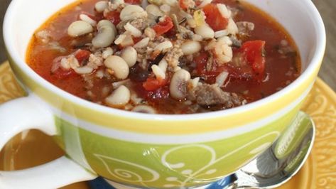 This is a modification of my father's hoppin' john recipe. The only difference between his and mine is the use of tomatoes. It's a great recipe for the holidays (New Year's) or any time during winter months. There are many versions of this recipe here, but this one is quick so you can throw it together after a long day at work for the whole family to enjoy! Canned Black Eyed Peas Recipe, Hoppin Johns, Hoppin John Soup, Hoppin John Recipe, Hot Bacon Dressing, Black Eyed Peas Recipe, Hoppin John, Tomato Gravy, Pea Recipes