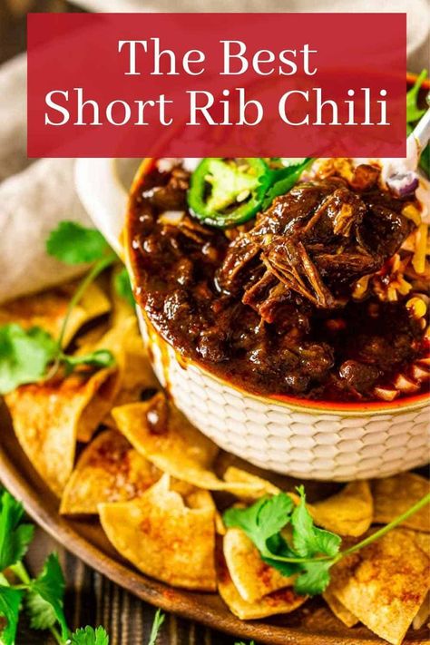 This the absolute best short rib chili you'll ever try! Made with a dried chile paste for a deeper flavor, every spoonful of this chili recipe is loaded with shredded short ribs and hearty black beans with the perfect spice kick. Everyone will devour this short rib chili! Short Ribs Chili Recipe, Short Rib Chili, Chili Recipe Crockpot, Chili Recipe Easy, Short Rib, Beef Short Ribs, Party Food And Drinks, Beef Ribs, Chili Recipe