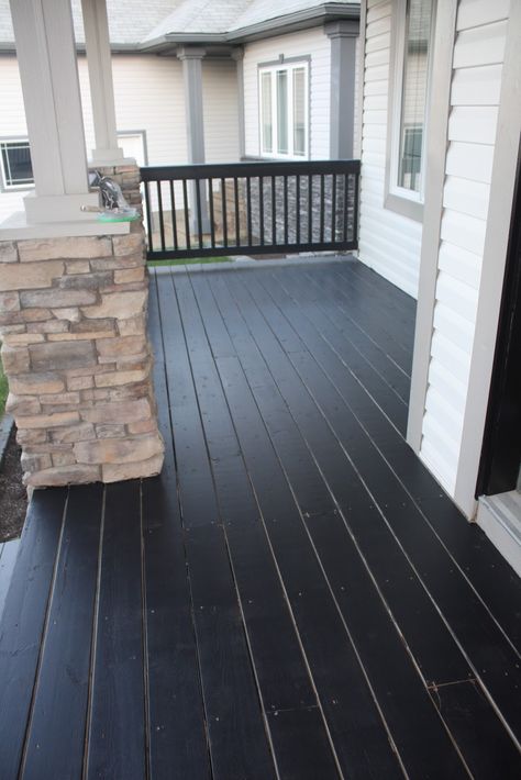 Brown Deck Black Spindles, Black Deck Paint, Painted Front Deck, Black Stained Porch, Dark Stained Porch, Black Painted Porch Floor, Black Wood Porch, Black Porch Floor, Front Porch Floor Colors