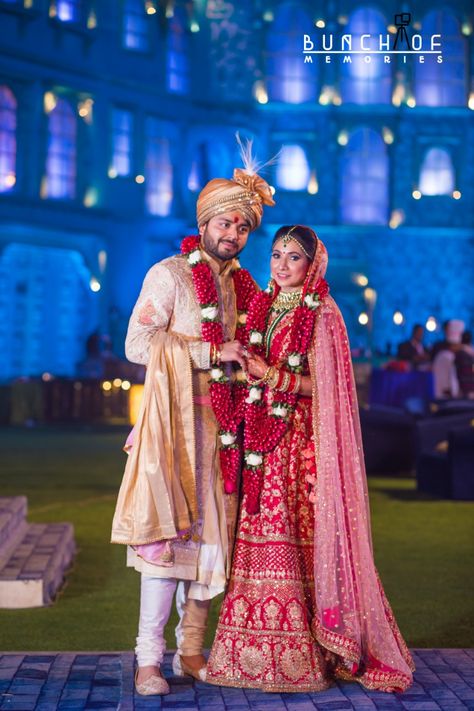 Candid Couple Shot - Bride in a Red Sequinned Lehenga and Groom in a Traditional Suit. WeddingNet #weddingnet #indianwedding #indianbride #bride #bridal #sequinned #lehenga #bridallehenga #weddinglehenga #suit #green #gold #red 
FOLLOW OUR INSTAGRAM @WEDDINGNET Dulhan Dulha Pose, Sadi Photo, Sequinned Lehenga, Couple Post, Bride Lehenga, विवाह की दुल्हन, Bride Groom Photoshoot, Dulha Dulhan, Candid Couple